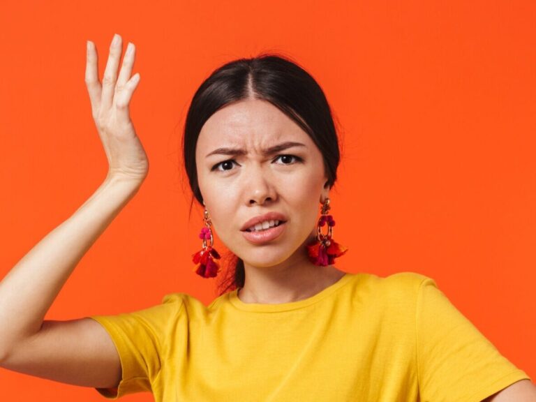 Confused woman asking what is mild celiac disease