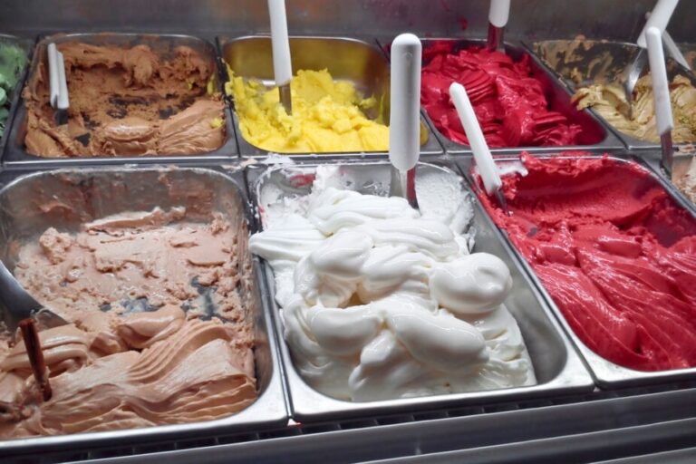 italian ice creams Grom 100 percent gluten free gelateria. Gelatos of all colors on display