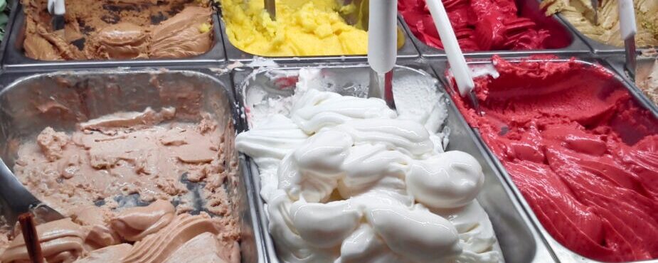 italian ice creams Grom 100 percent gluten free gelateria. Gelatos of all colors on display