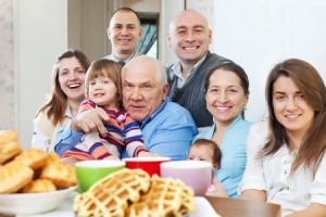 a celiac disease test is needed for family members if someone has celiac disease. This is a picture of a family around a dinner table.