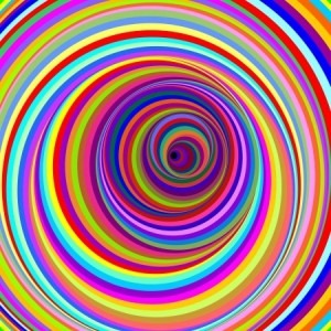 pots syndrome can cause dizziness. image is of a colorful spiral to indicate dizziness.