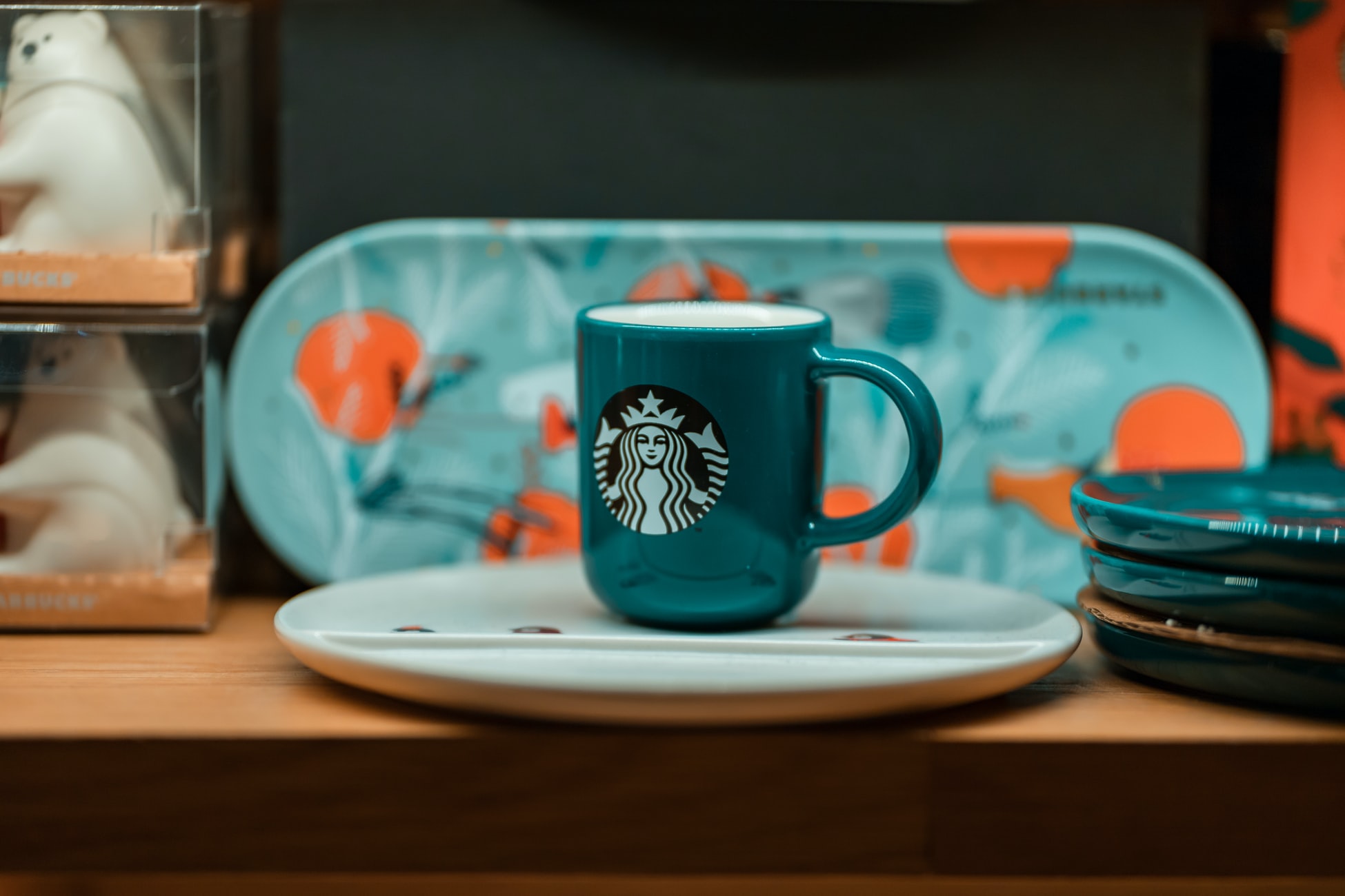 A Starbuck's mug containing an oat milk latte