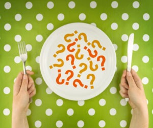 A sibo diet can be an elemental sibo diet or others, this is a picture of a plate with question marks to indicate wth confusion around which diet is best for sibo