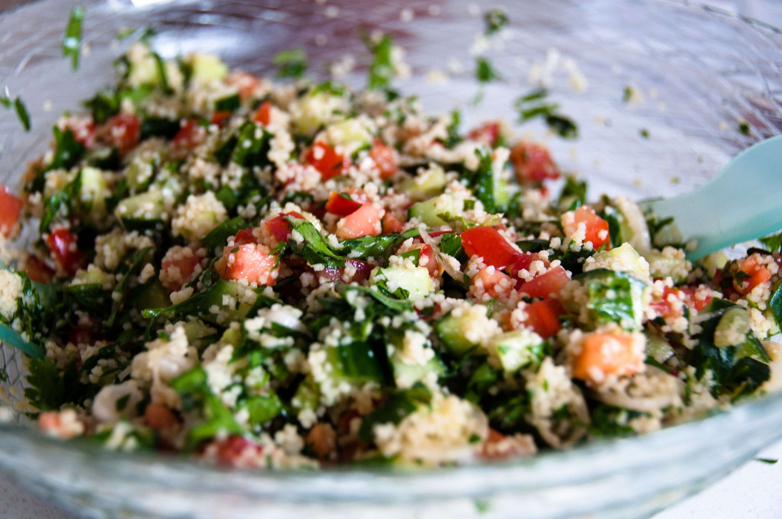 Fonio tabouleh on a plate. Fonio is a grain that has health benefits. Fonio recipes are in the article