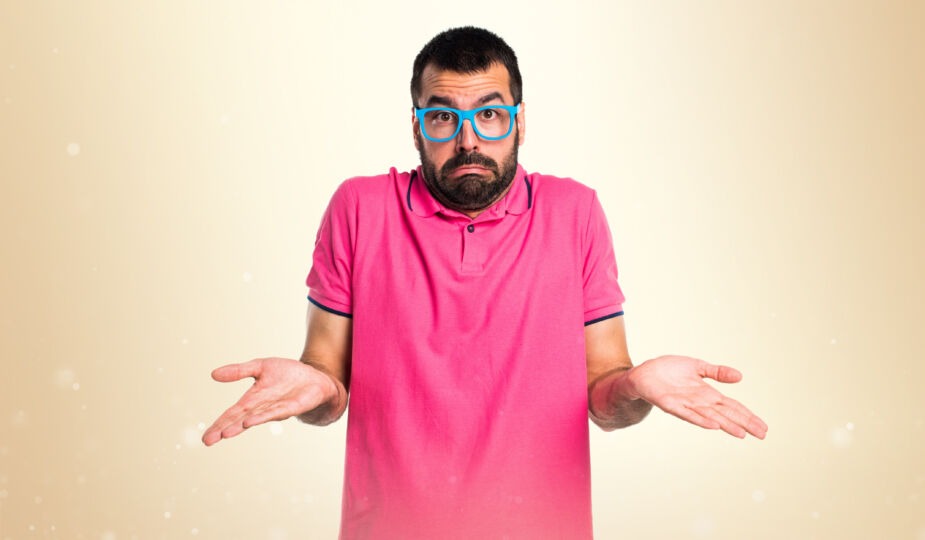 a confused man in a ink shirt needs a celiac doctor to help him clarify things