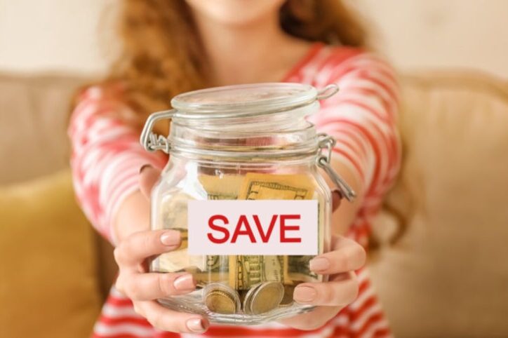 Prolon fasting mimickind diet discount code and cost saving tips. Woman holding out a jar that says save on it.