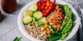 Low histamine diet bowl of chicken cucumber quinoa avo and red bell pepper.